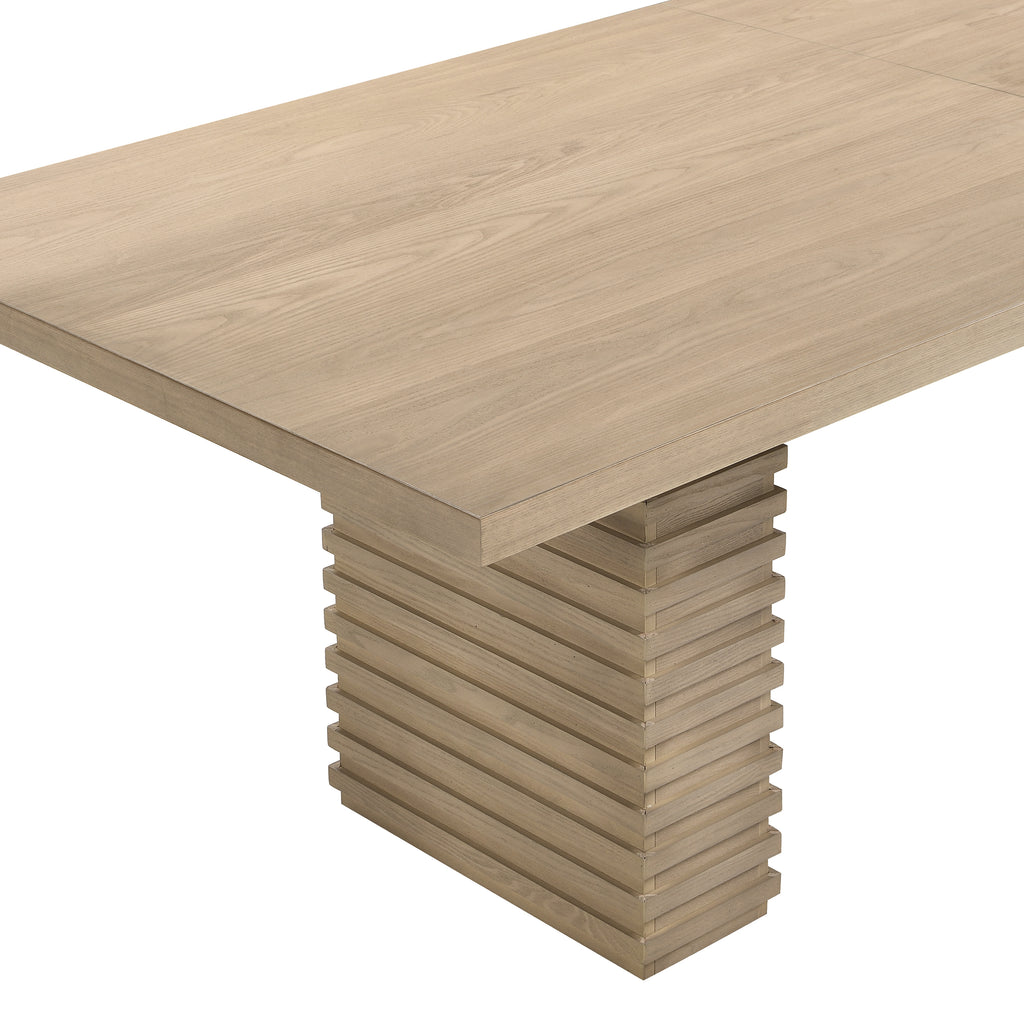 Close-up of 95 inch light ash dining table showing smooth wood grain top and sculpted pedestal base detail.