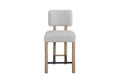 Upholstered counter stool with oak finish and stain-resistant fabric, ideal for modern kitchen or bar seating.