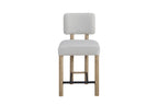 Upholstered counter stool with oak finish and stain-resistant fabric, ideal for modern kitchen or bar seating.