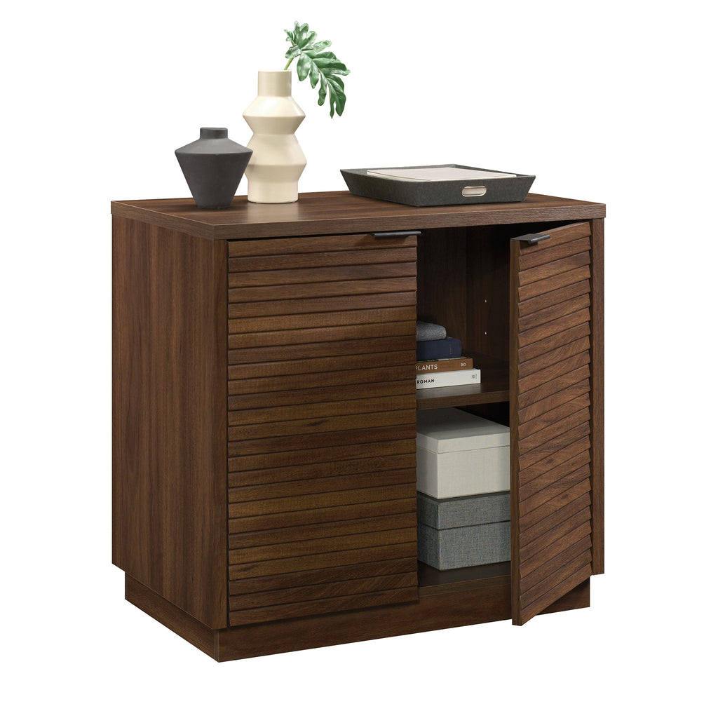 Library Base, Brown finish cabinet styled with decor on top and one door open, showcasing mid-century modern storage solution.