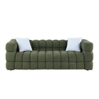Front view of Olive Green Boucle Sofa - 3 Seater, Marshmallow Cozy with two light blue accent pillows and plush seating.