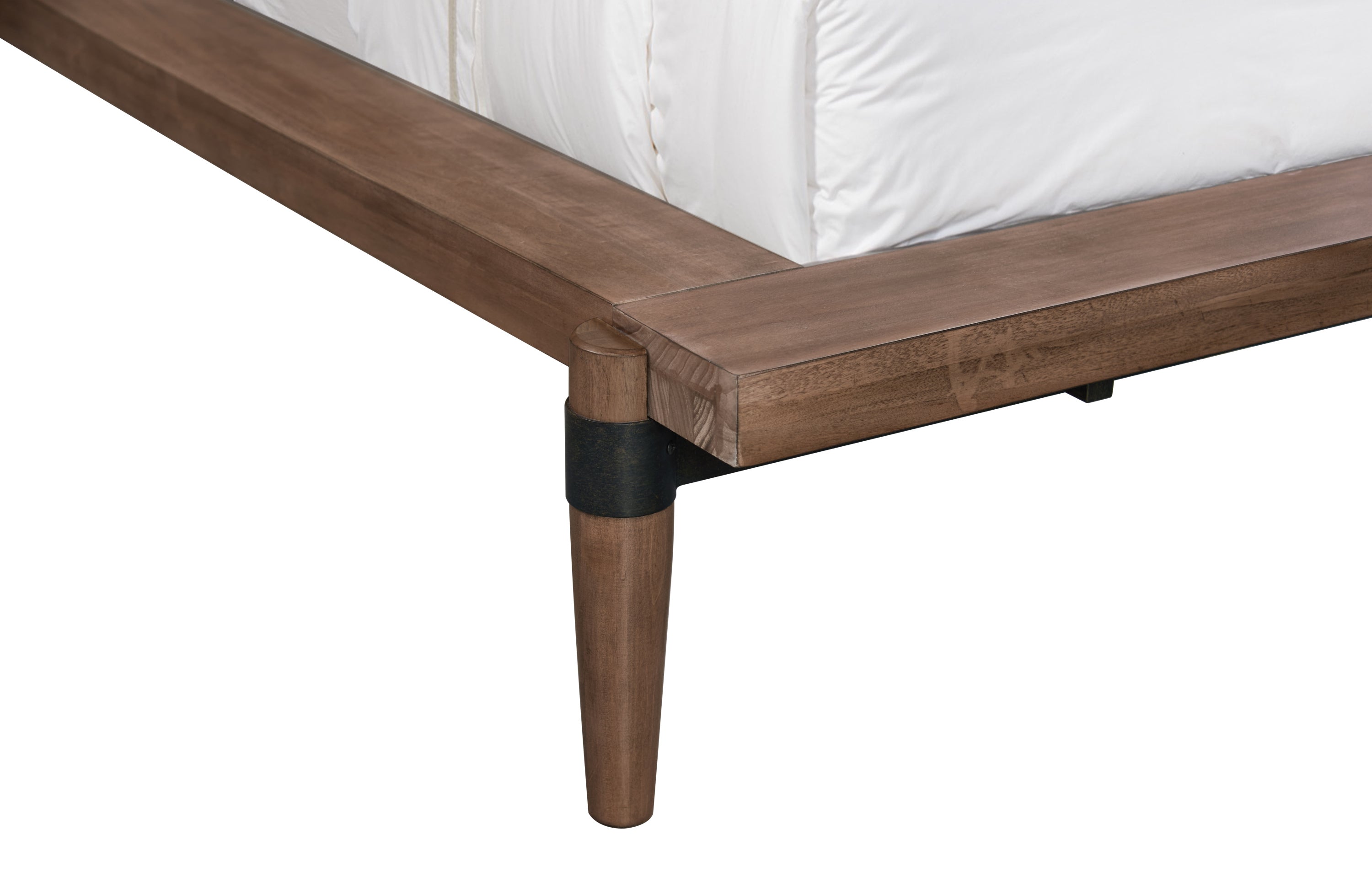 Detail of Queen Size Platform Bed corner frame in walnut finish with tapered leg and black metal accent for added stability.