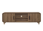 Mid-century modern wooden media console in brown with sliding doors, black handles, open shelving, and tapered legs.