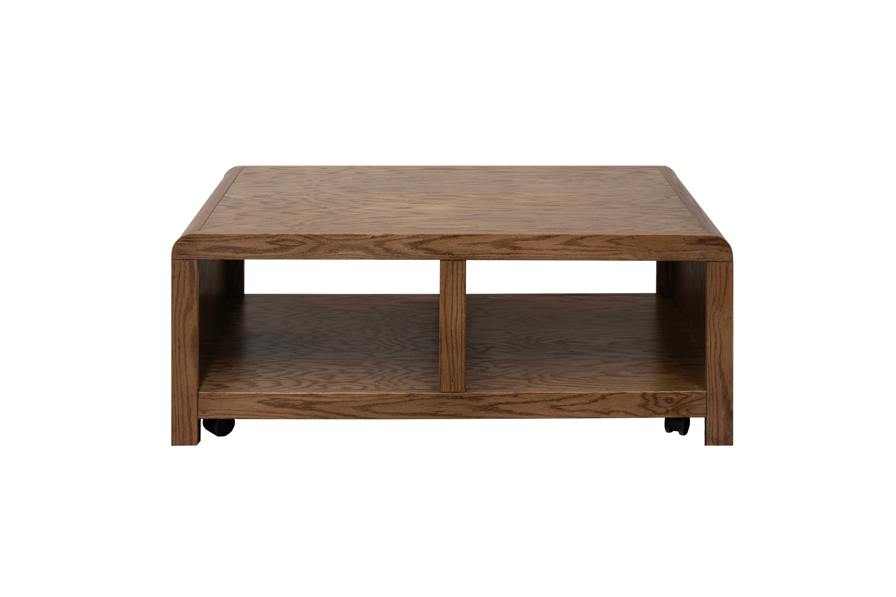 Front view of Haven Oak Coffee Table - 49 Inch with bourbon finish, highlighting dual open storage compartments and caster wheels.