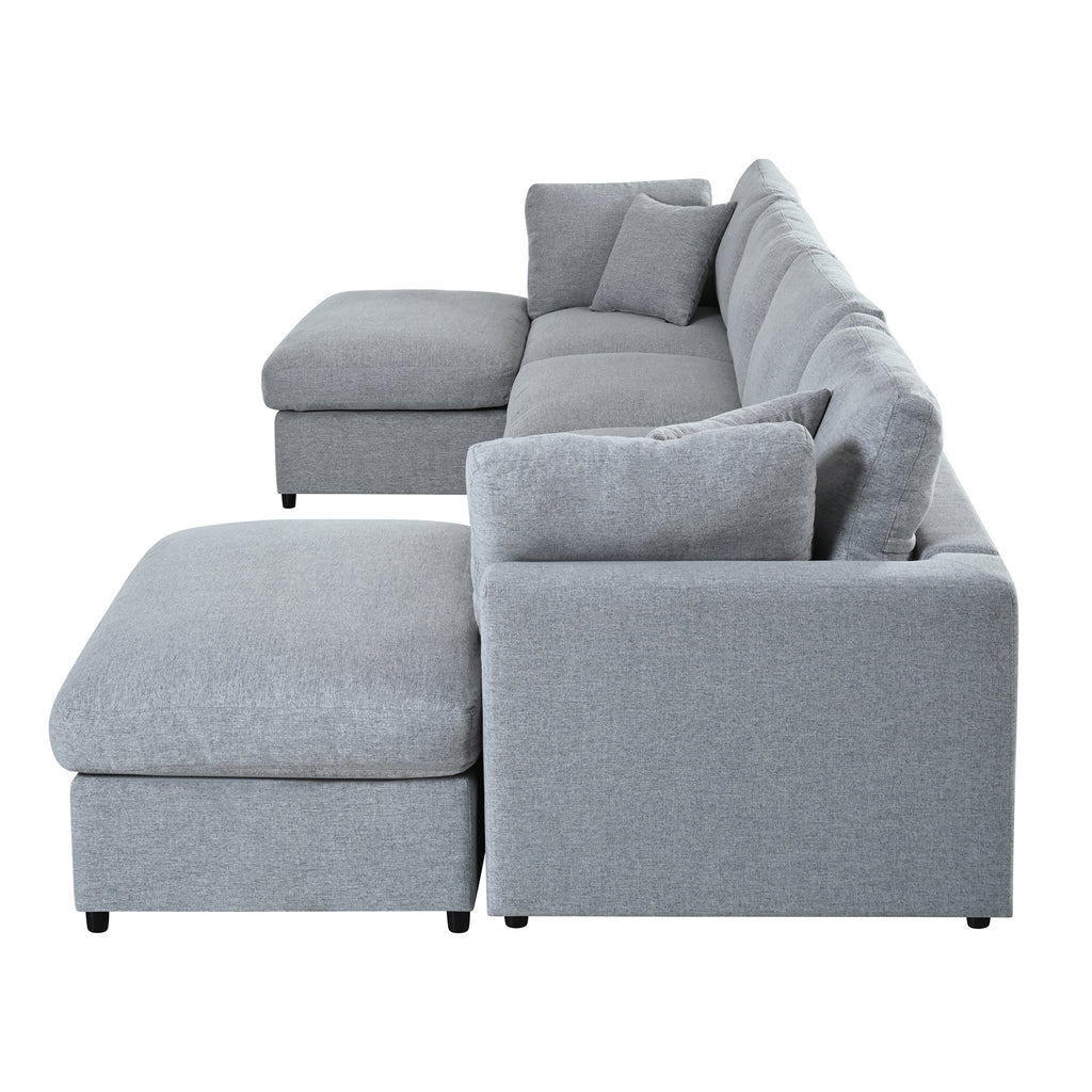 Side view of 130' U-Shaped Sectional Sofa with 2 Ottomans in light gray chenille, showcasing spacious seating for large living rooms.