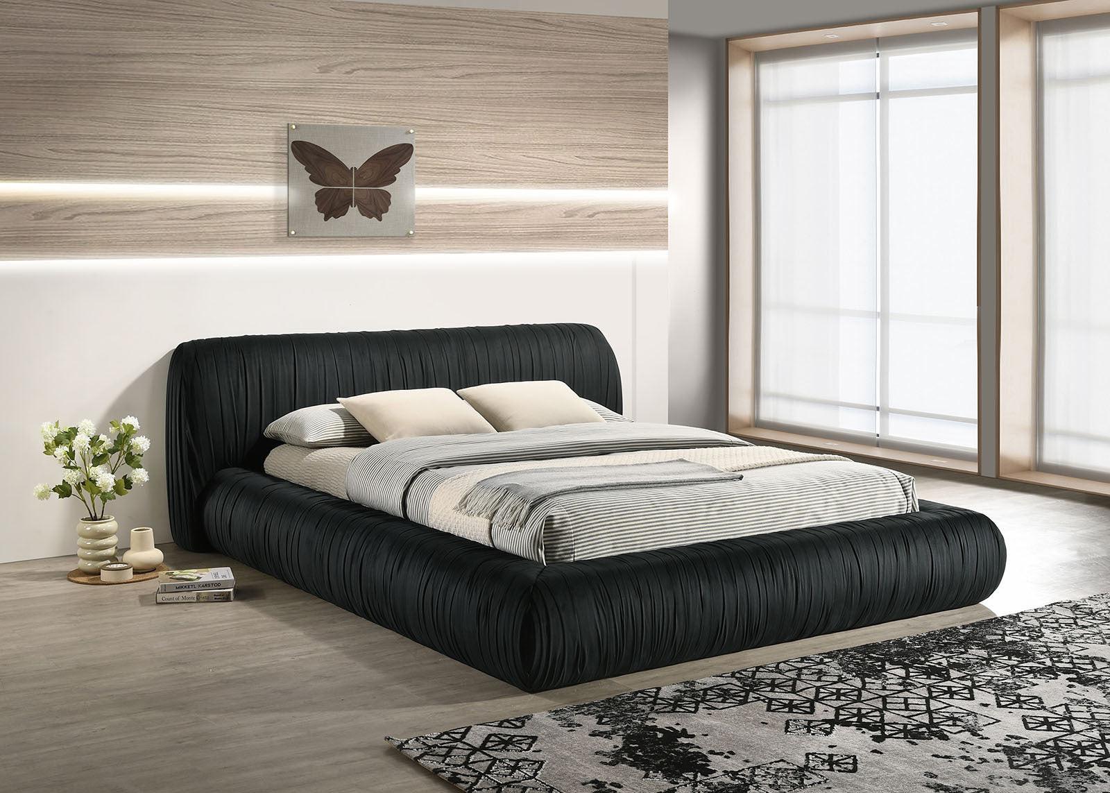 Black Upholstered King Size Bed with Pleated Design.