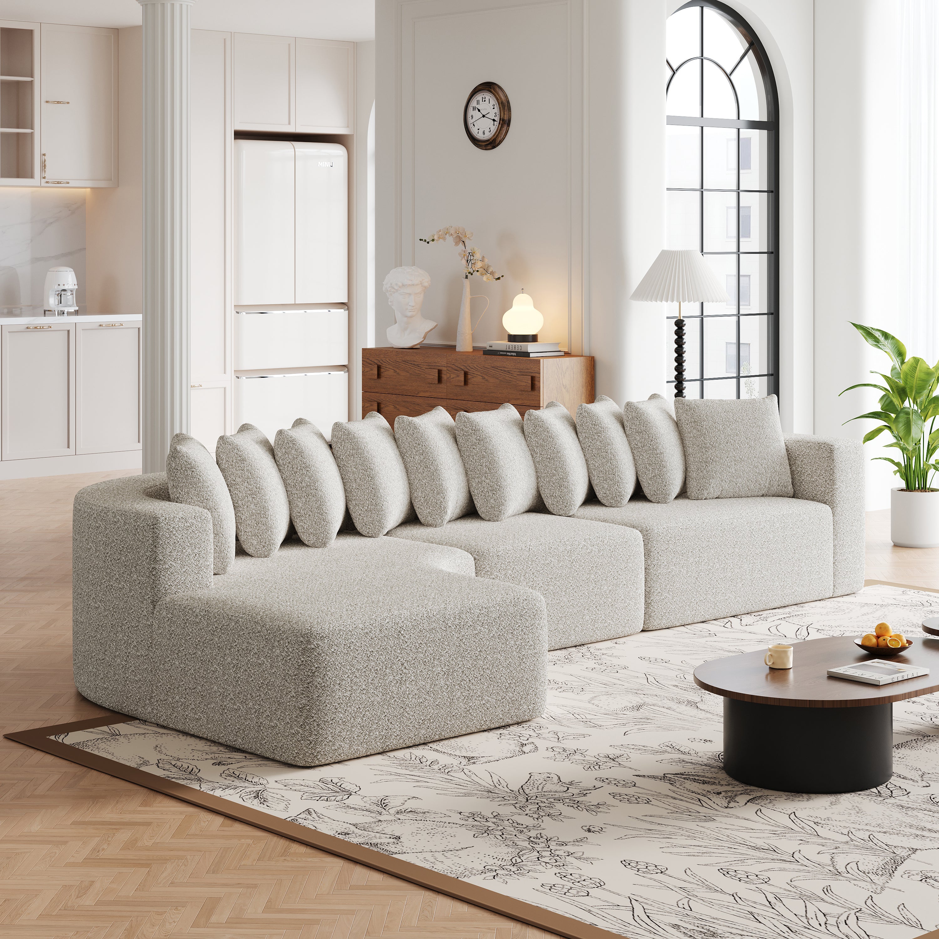 Chenille Sectional Sofa - Modern Cloud Curved Set with plush cushions in a bright room, enhancing comfort and luxury appeal.