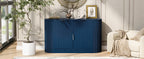 Modern navy blue MDF storage cabinet with curved doors styled in a bright living room next to a potted plant and armchair.