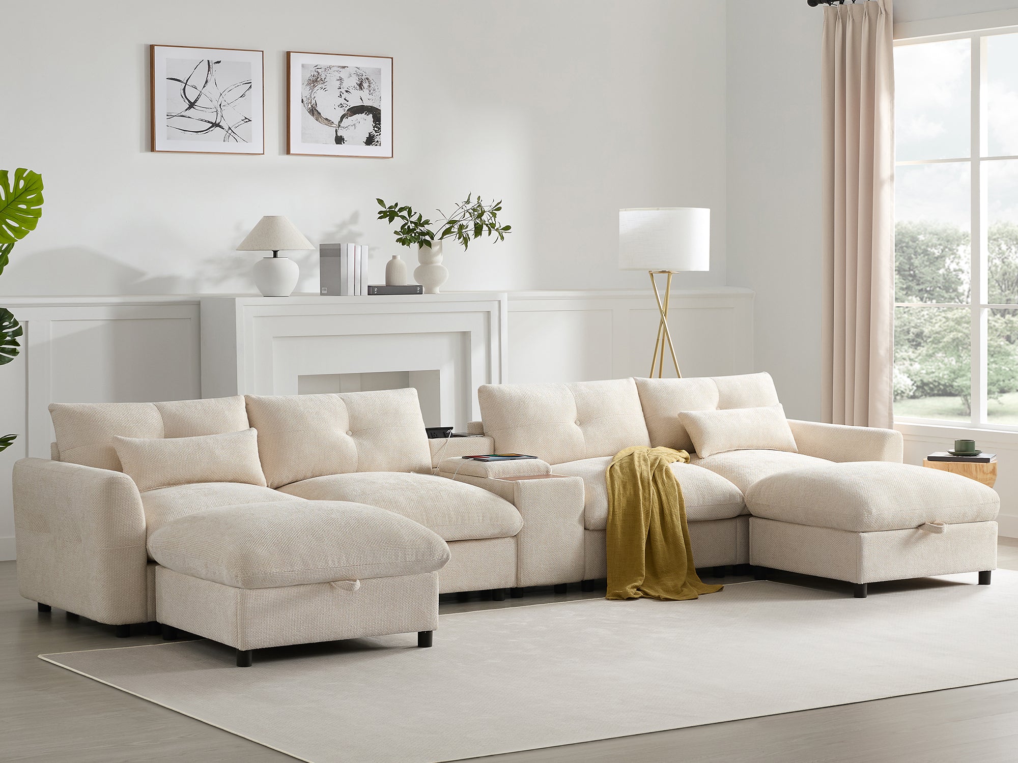 Elegant modular sectional sofa with wide seats, storage, and console in a bright living room. Designed for comfort and convenience.