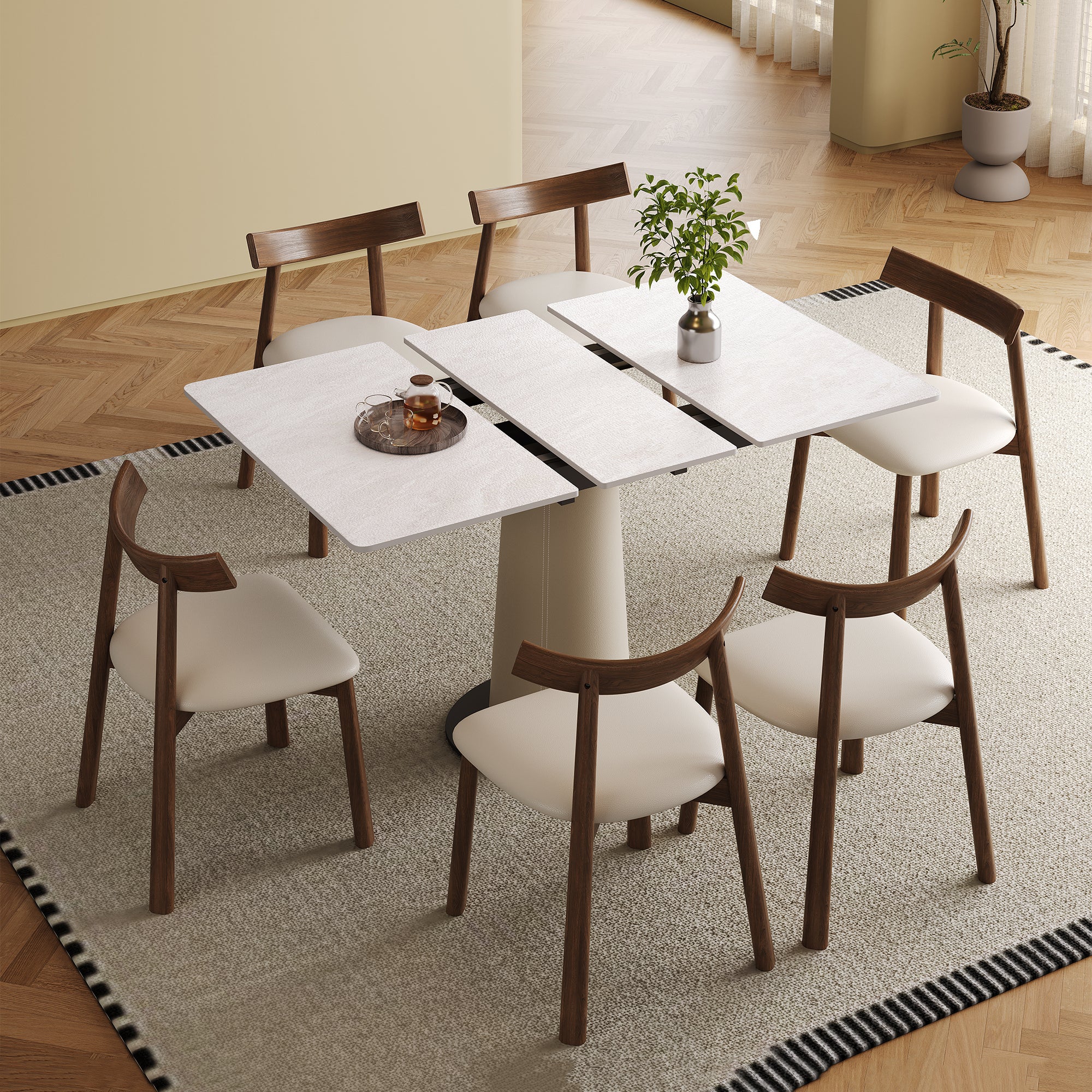 Expandable dining table set with rock slab top and six wooden chairs, ideal for modern apartments and adaptable for space-saving needs.