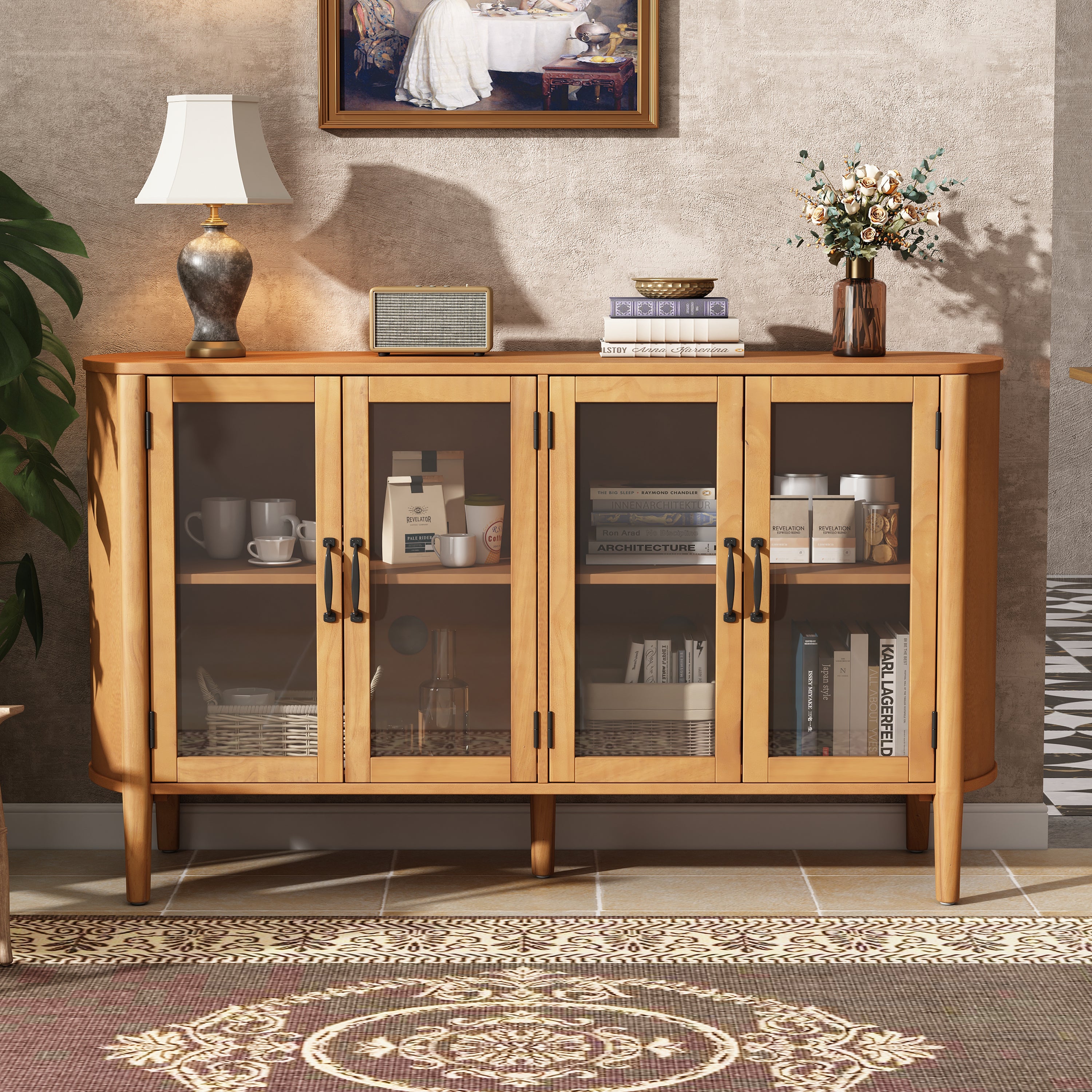 Natural wood storage cabinet with 4 glass doors, gold handles, and adjustable shelves, styled in an entryway with decor accents.