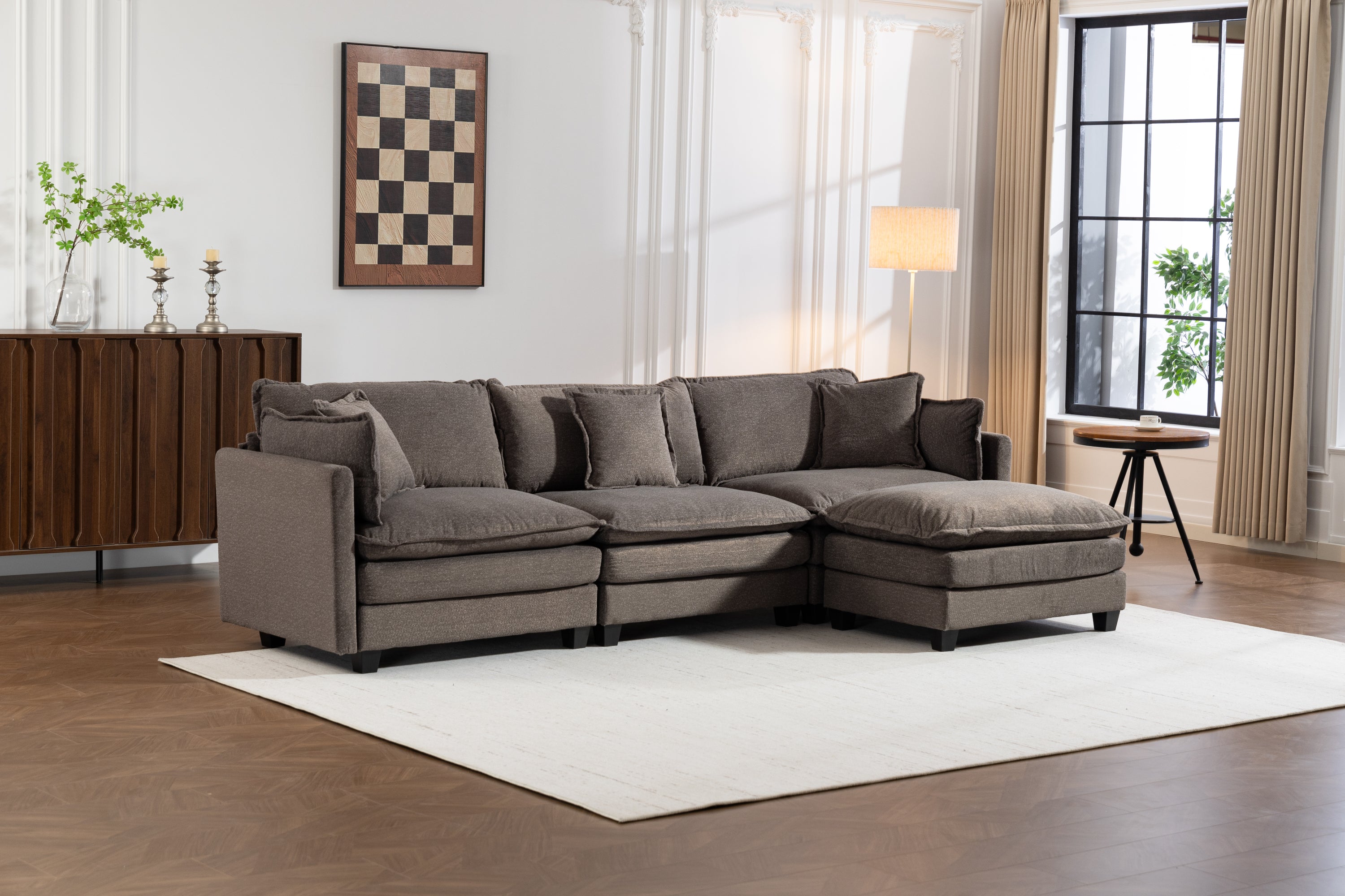 Sectional Sofa with Ottoman in modern living room setting. Features breathable chenille fabric and plush waist pillows for stylish comfort.