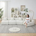 Curved Sectional Sofa with 4 Pillows for Stylish Seating.
