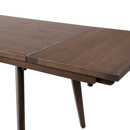 Close-up of the Oak Extendable Dining Table leaf joint, highlighting the seamless dark brown finish and solid oak craftsmanship.