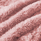 Close-up of ultra-soft pink plush fabric texture on modular sofa, highlighting its cozy and luxurious feel for home interiors.