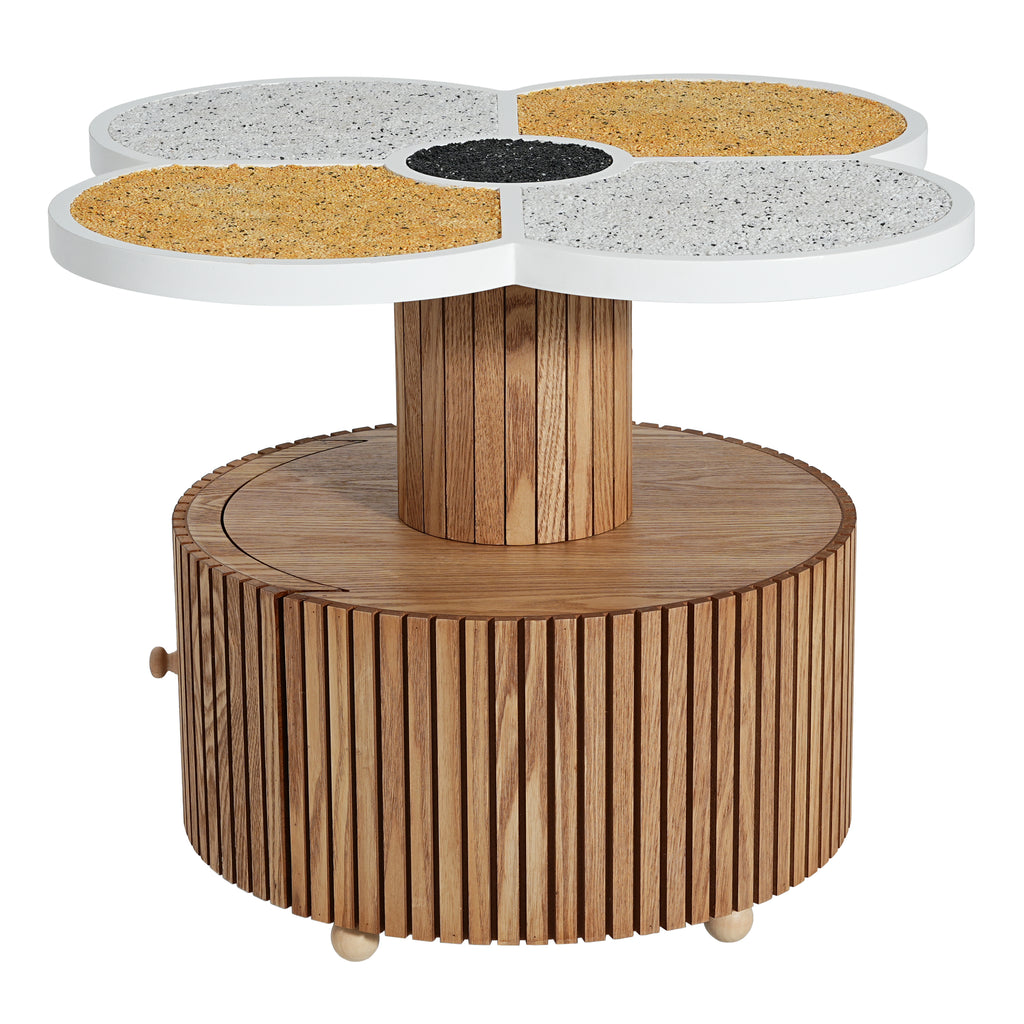 Side table with flower-shaped terrazzo top and cylindrical wood-grain base, blending artful design with functional storage.