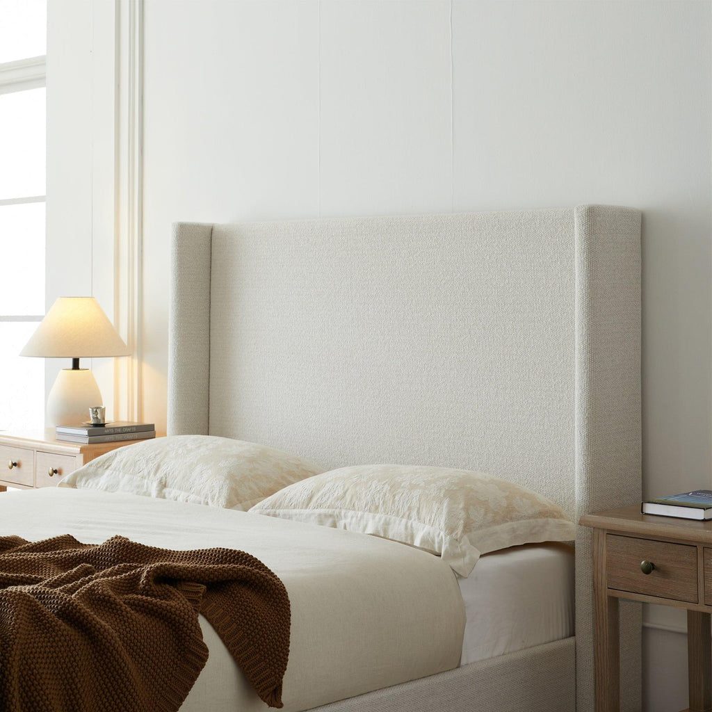 Hosford Minimalist Upholstered Wingback Bed - California King.