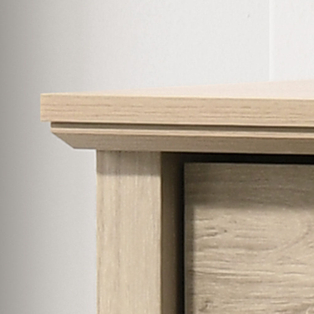 Top corner detail of Elara Oak 4-Drawer Chest - Sleek Storage Solution highlighting smooth light oak finish and clean edges.