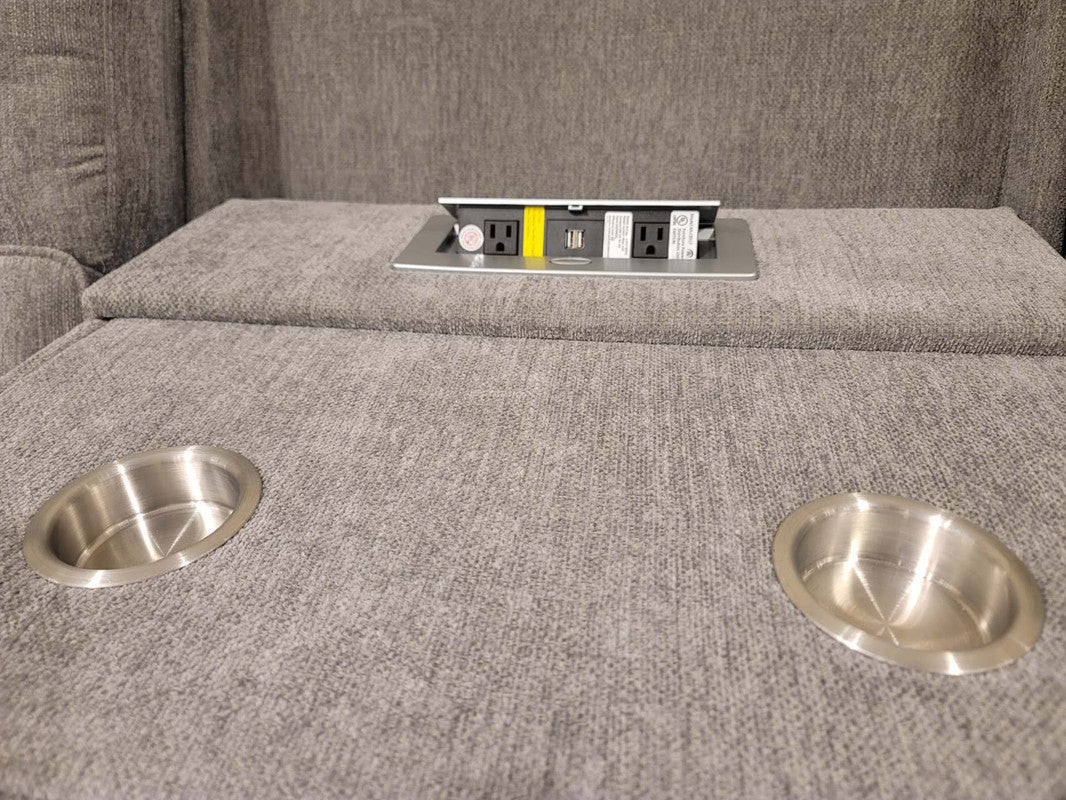 Built-in USB charging ports and power outlets with dual cupholders on the Anthony 114" reclining sectional. Ideal for tech-friendly lounging.