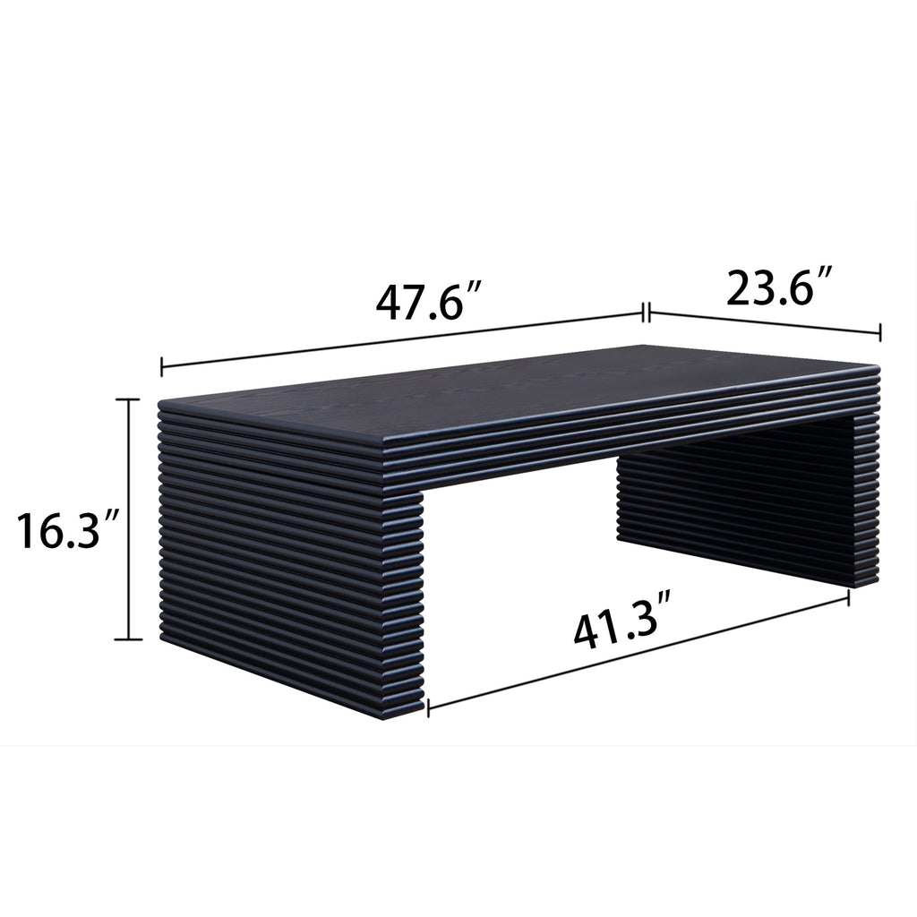 Dimensional view of 47.6 modern black ribbed coffee table with measurements: 47.6 in length, 23.6 in width, and 16.3 in height.