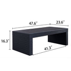 Dimensional view of 47.6 modern black ribbed coffee table with measurements: 47.6 in length, 23.6 in width, and 16.3 in height.