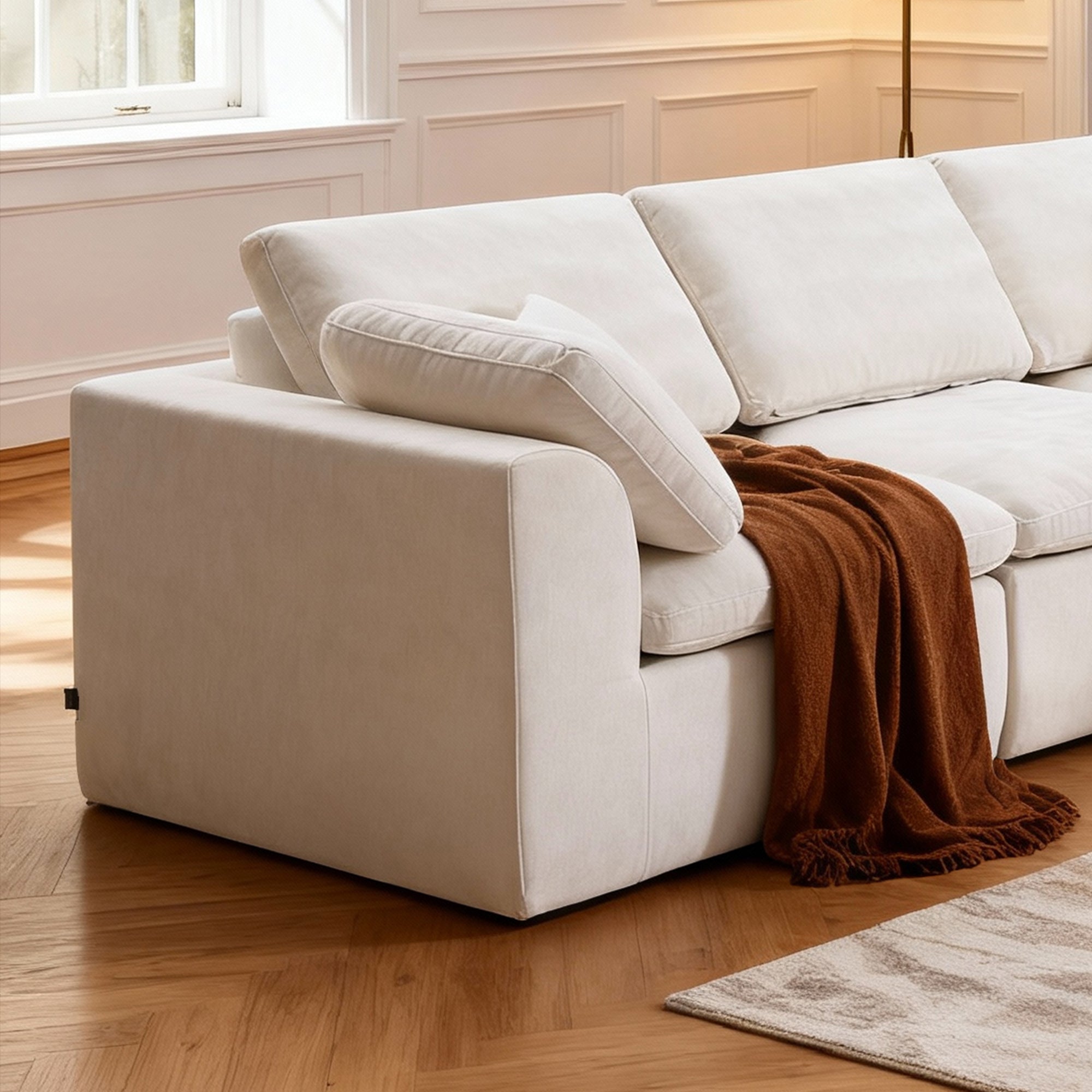 Close-up of armrest and cushions on L-Shaped Sectional Sofa with Chaise, highlighting soft chenille fabric and cozy design details.