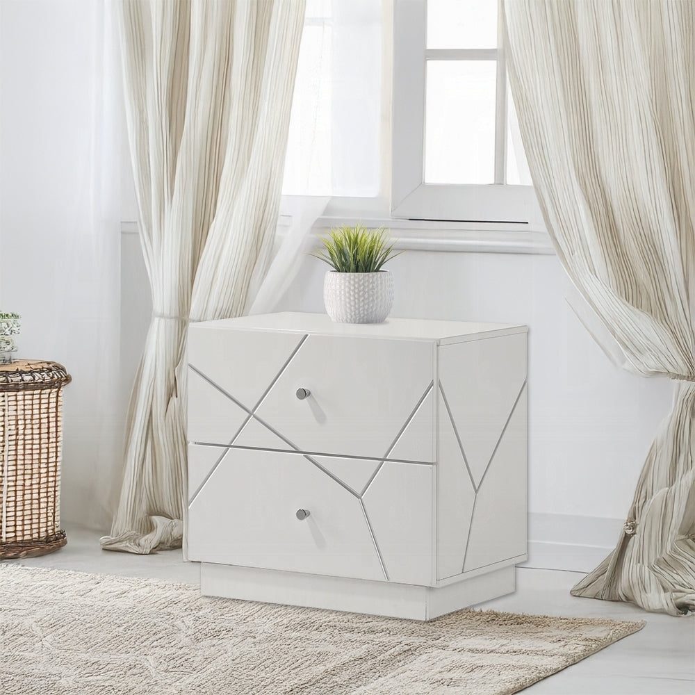 Modern White Nightstand with 2 Drawers in a bright bedroom setting, featuring embossed geometric design and chrome knobs.
