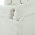 Back view of modular U-shaped sectional sofa with ottoman, highlighting the textured chenille upholstery and sturdy frame.