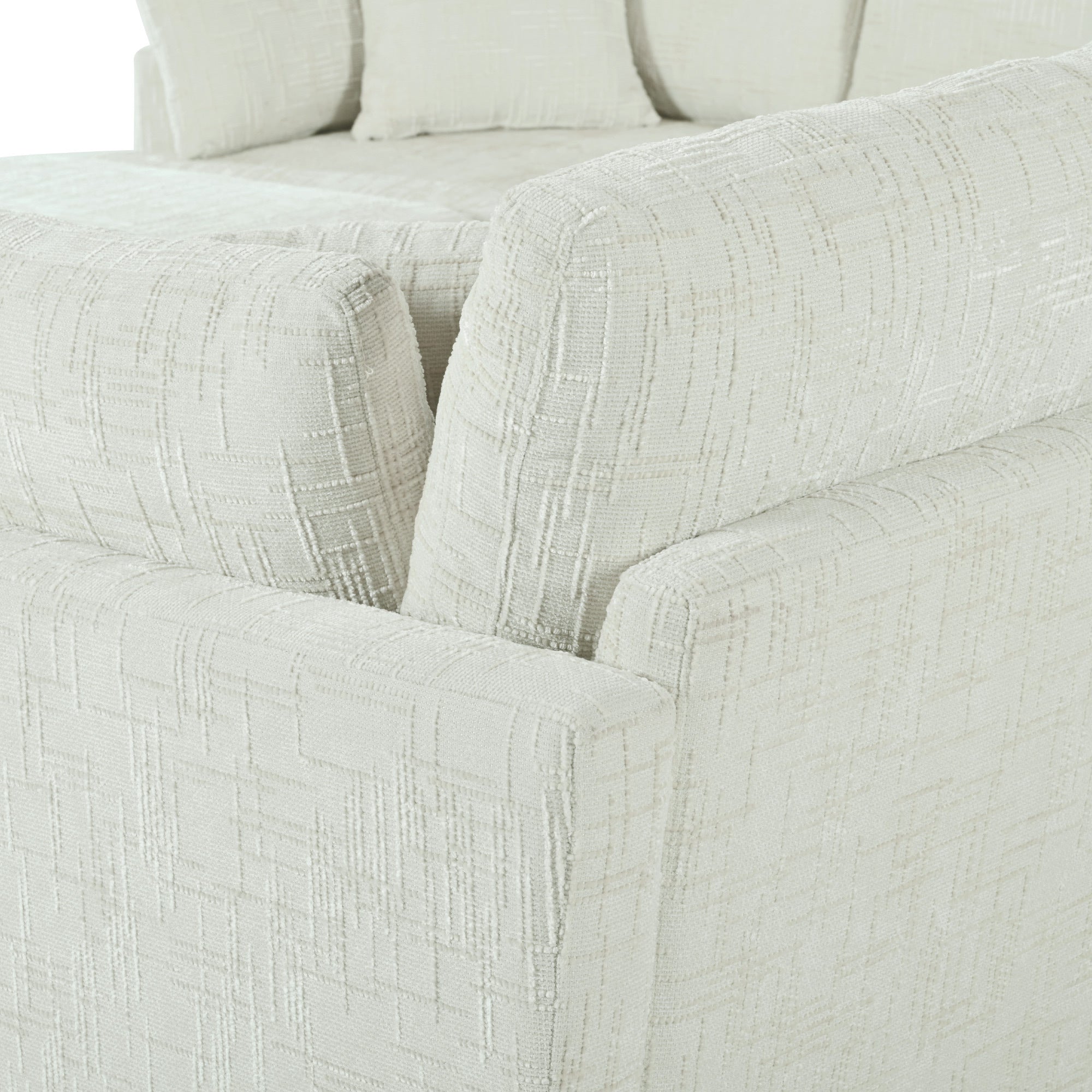 Back view of modular U-shaped sectional sofa with ottoman, highlighting the textured chenille upholstery and sturdy frame.