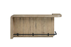 Rustic knotty oak counter-height bar with a curved end and a matte black metal footrest on a clean white background.