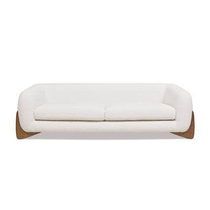 Front view of Alpine Sherpa Sofa Ivory White with clean lines, plush cushions, and oak base for a minimalist modern aesthetic.