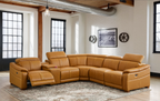 Tan leather modular sectional with power recliner, adjustable headrests, and a storage console with cup holders.