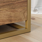 Close-up of gold metal frame base on brown lateral file cabinet, highlighting sturdy construction and modern design.