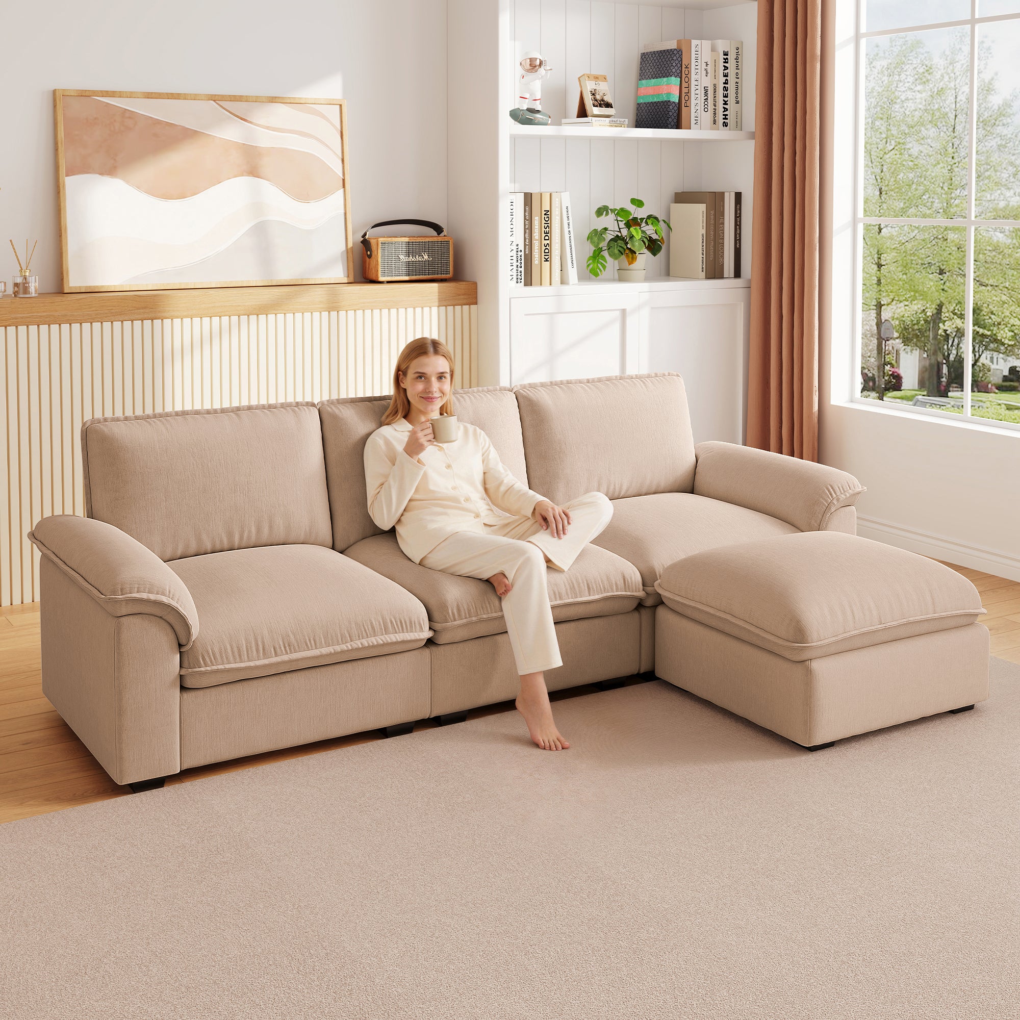 Beige chenille L-shaped modular sectional sofa with plush cushions in a cozy, sunlit living room.