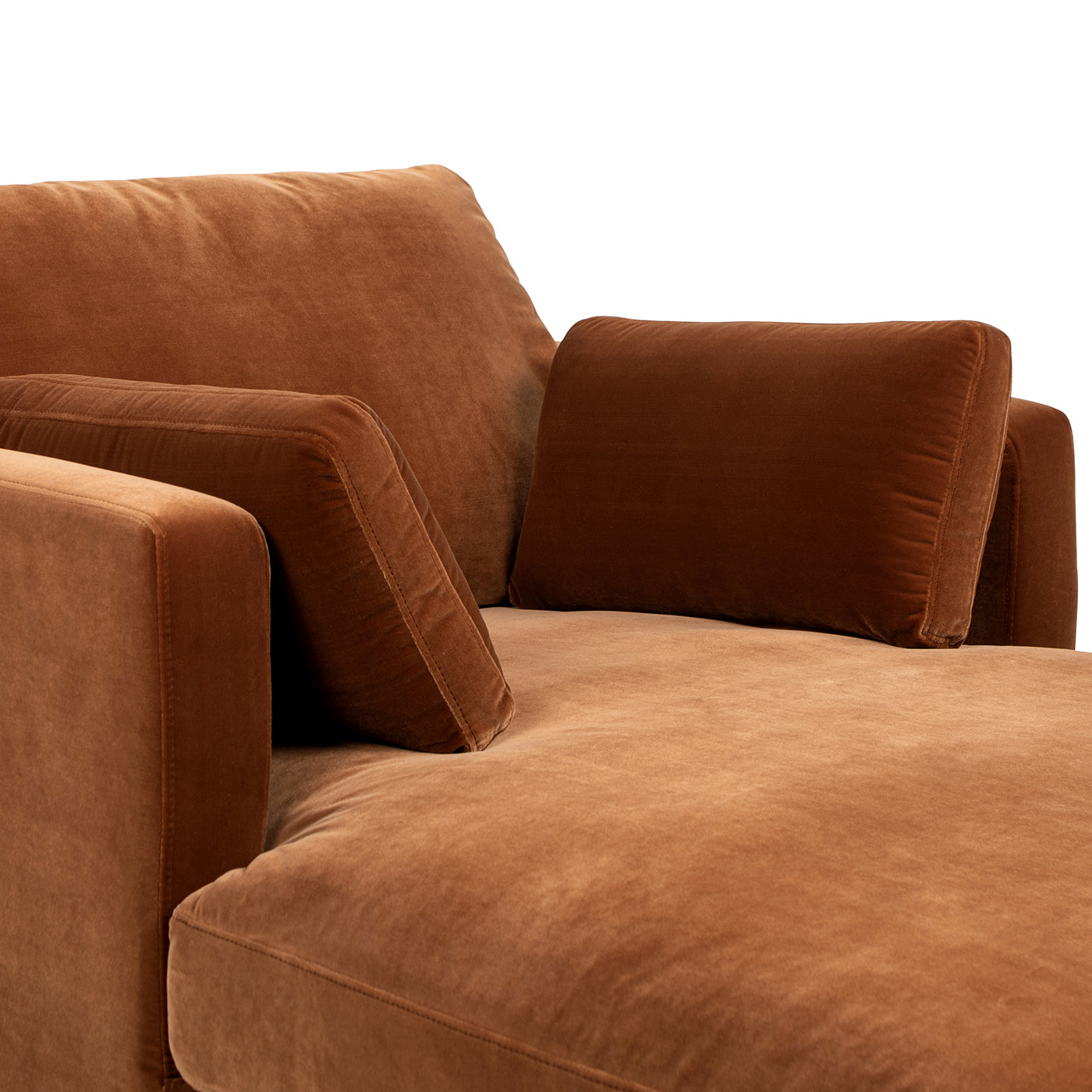 Close-up of plush burnt orange velvet cushions and armrests on the Knox 65' Modern Farmhouse Chaise Lounge Chair for comfort and style.
