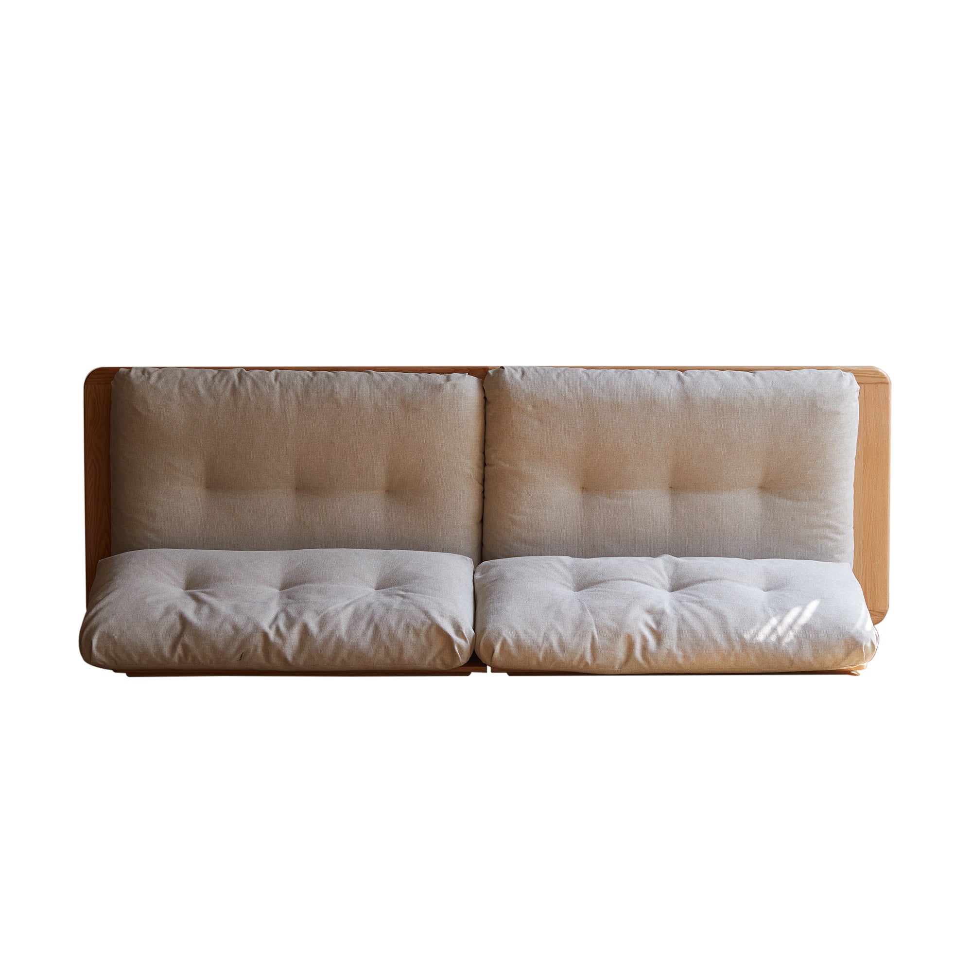 Solid wood sofa with partially reclined cushions, demonstrating adjustable comfort and premium upholstery design.