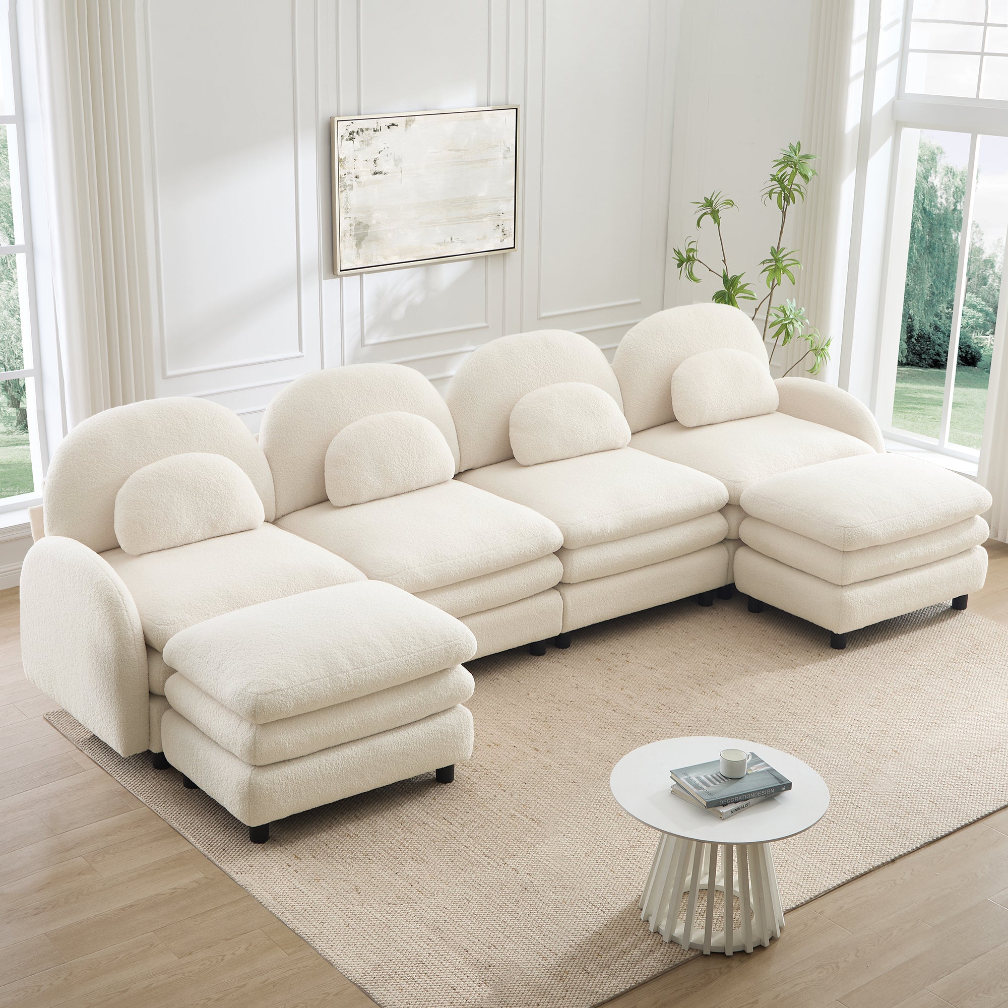 Beige white, 4-seat teddy fabric modular sectional sofa with curved backs, lumbar pillows, and two movable ottomans.