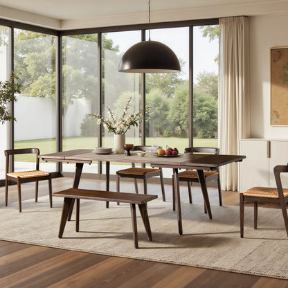 Solid Oak Extendable Dining Table in dark brown set for 6-8 seats in a modern dining room with large windows and natural light.