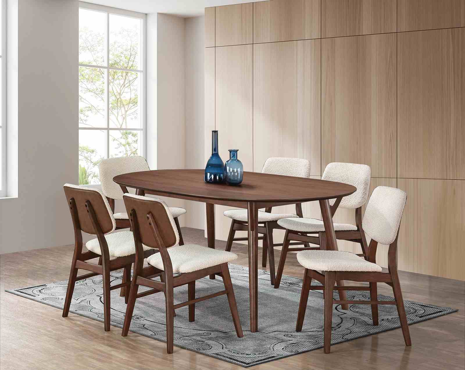 Complete mid-century dining set with angled leg chairs and padded seats in beige, paired with a walnut dining table.