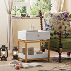 Modern white end table with a gold metal frame, featuring a single storage drawer and an open bottom display shelf.