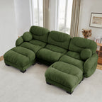 U-shaped modular sectional sofa in green chenille, featuring pleated detailing, two ottomans, and round throw pillows.