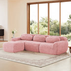 Angled view of plush modular sofa in pink with movable ottoman. Ergonomic and anti-slip, ideal for cozy and stylish living room setups.