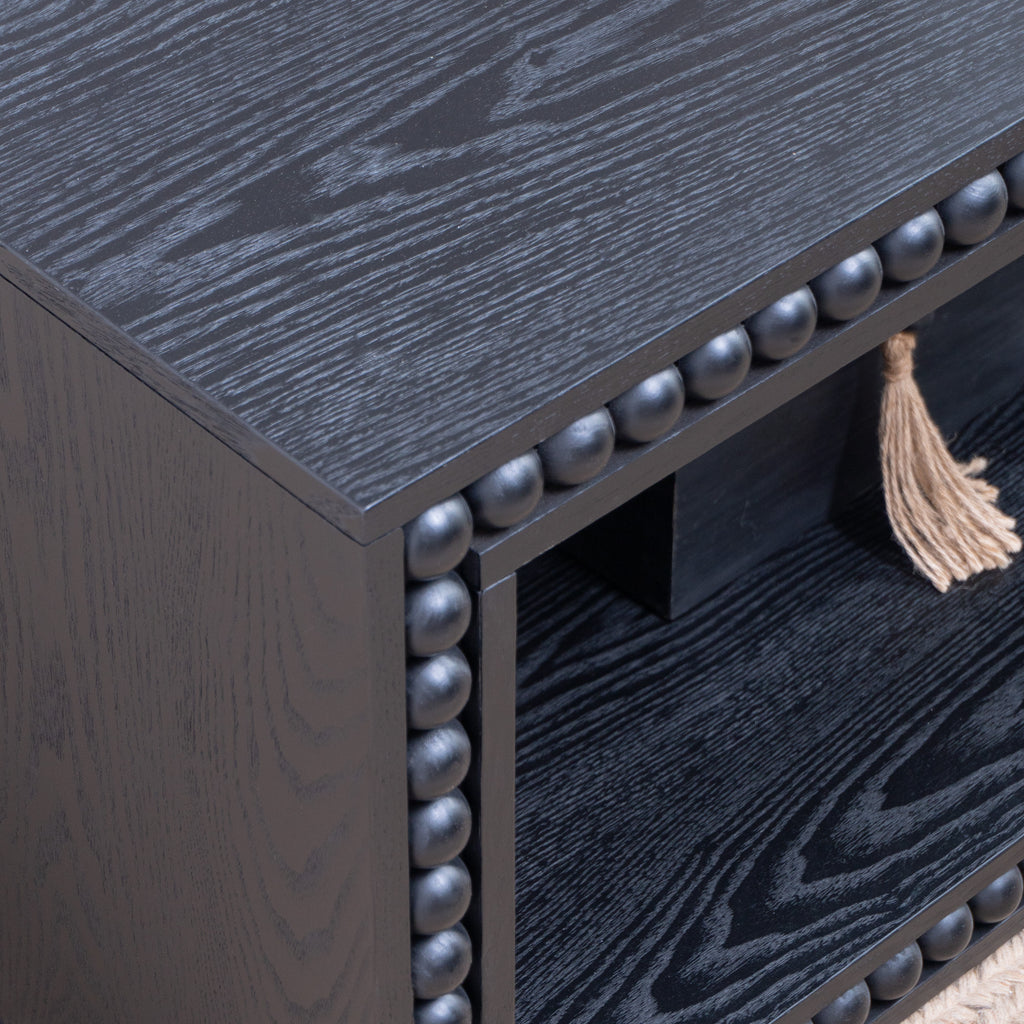 Close-up of Black Beaded Coffee Table corner showing detailed beaded edge and wood grain texture in solid black finish.