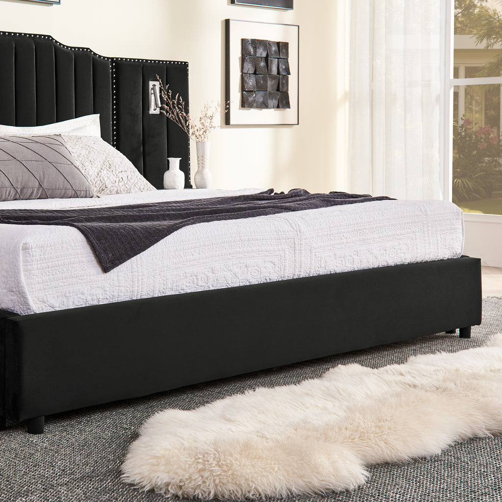 Side view of queen upholstered bed frame with velvet finish and sturdy base, styled with a cozy rug and modern decor.