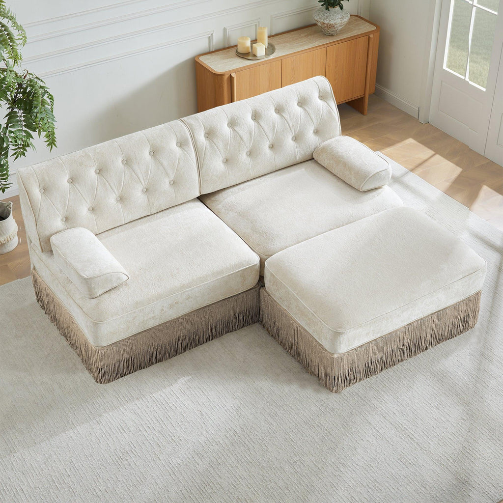 Modular Chesterfield Style Sofa with Tassel Skirt.