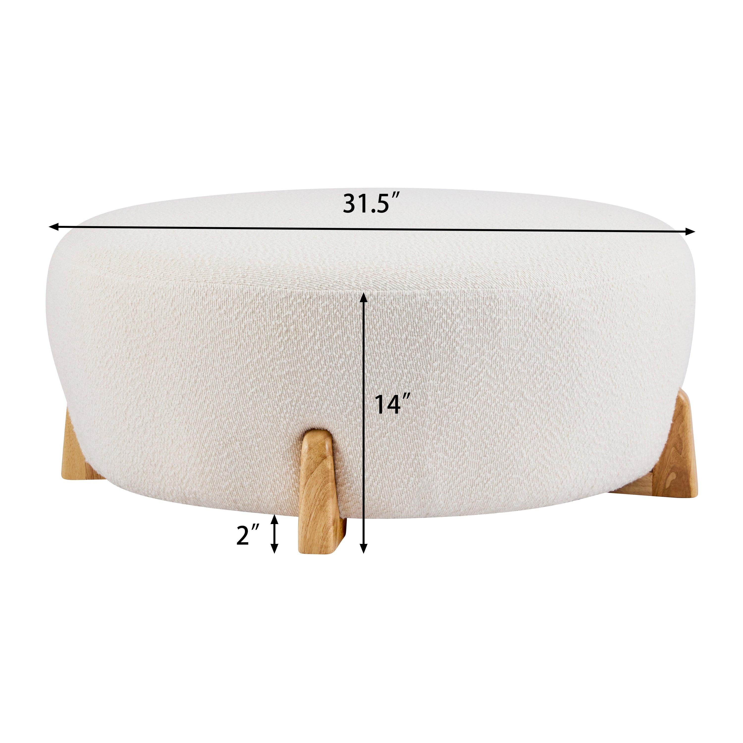 Modish Round Ottoman with Boucle Top and Natural Wood Legs.