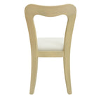 Rear view of a contemporary dining chair with a sculpted light ash wood backrest and beige cushioned seat.