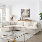 Versatile modular sectional sofa with ottoman arranged in a U-shape, ideal for spacious living rooms and modern interiors.