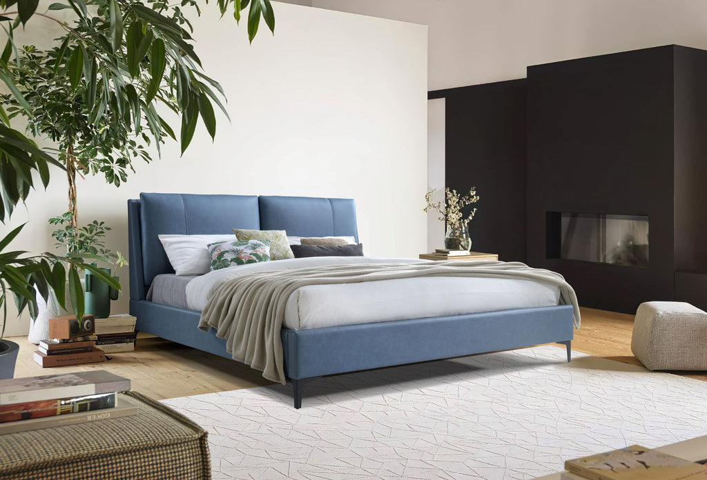 Modern blue upholstered queen bed frame with a sleek, vertical-stitched headboard and slender black metal legs.