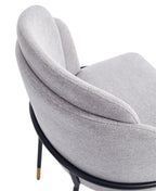 Close-up of Modern Dining Chair - Stylish Grey - Durable Metal Base showing textured twill fabric and cushioned backrest for comfort.